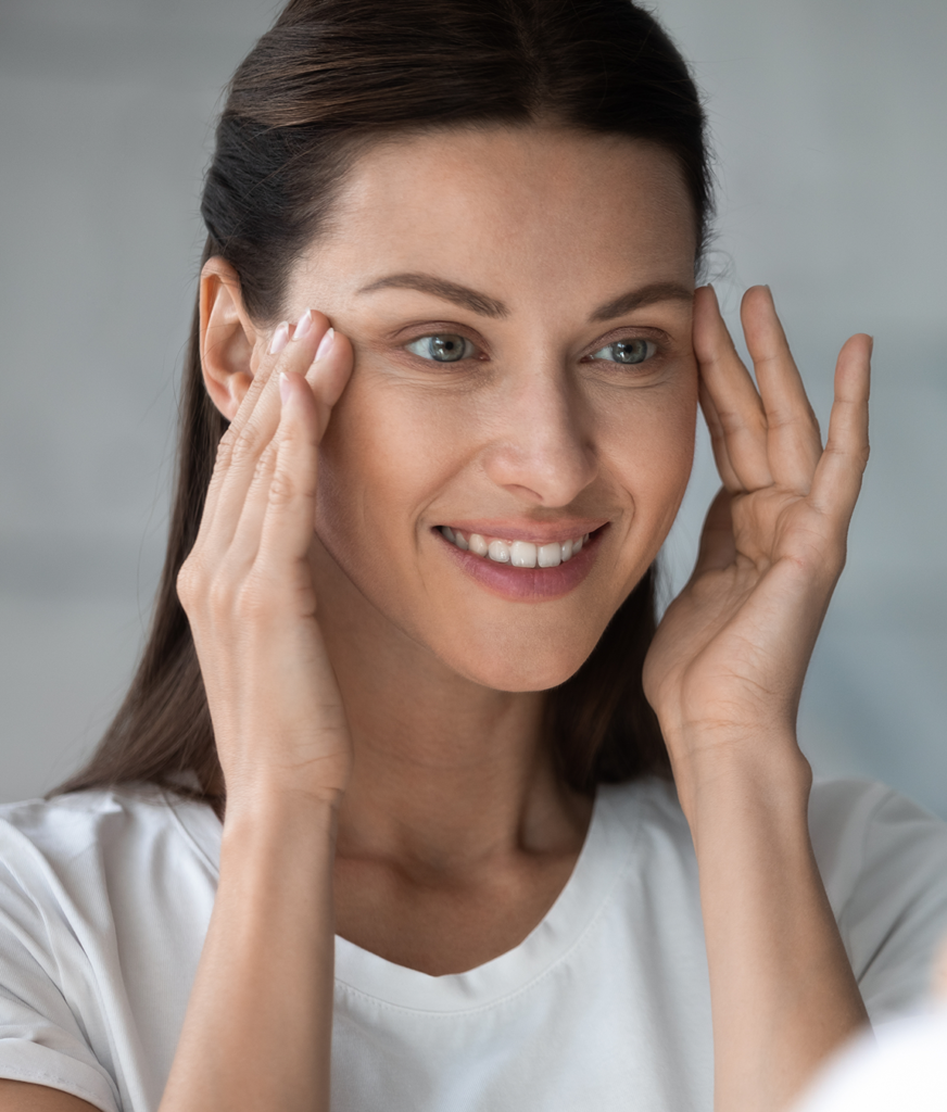 Woman touching her face