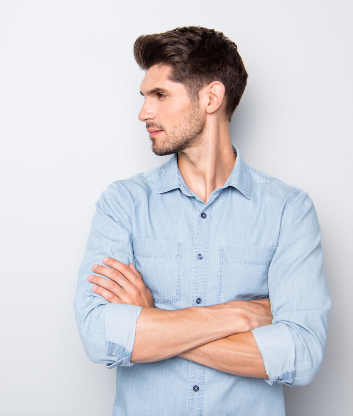 Man with a full head of hair after scalp restoration treatments