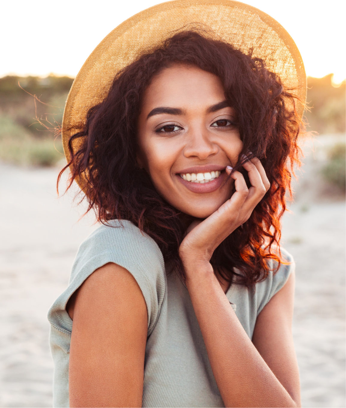 Smiling woman with great skin at the beach