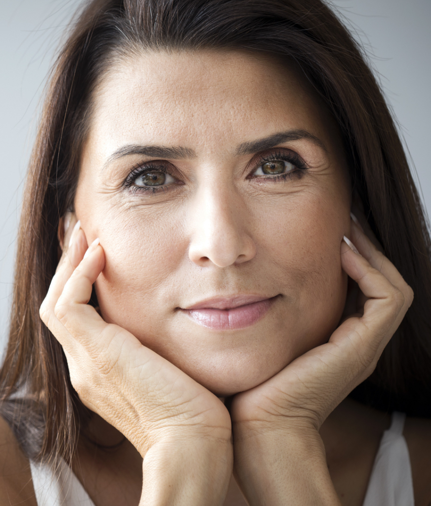 Woman resting her face in her hands