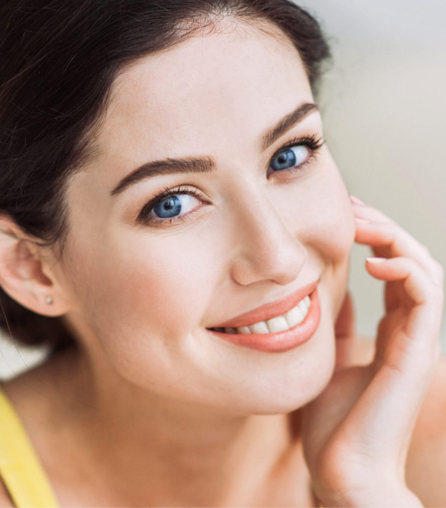 Girl with blue eyes smiling